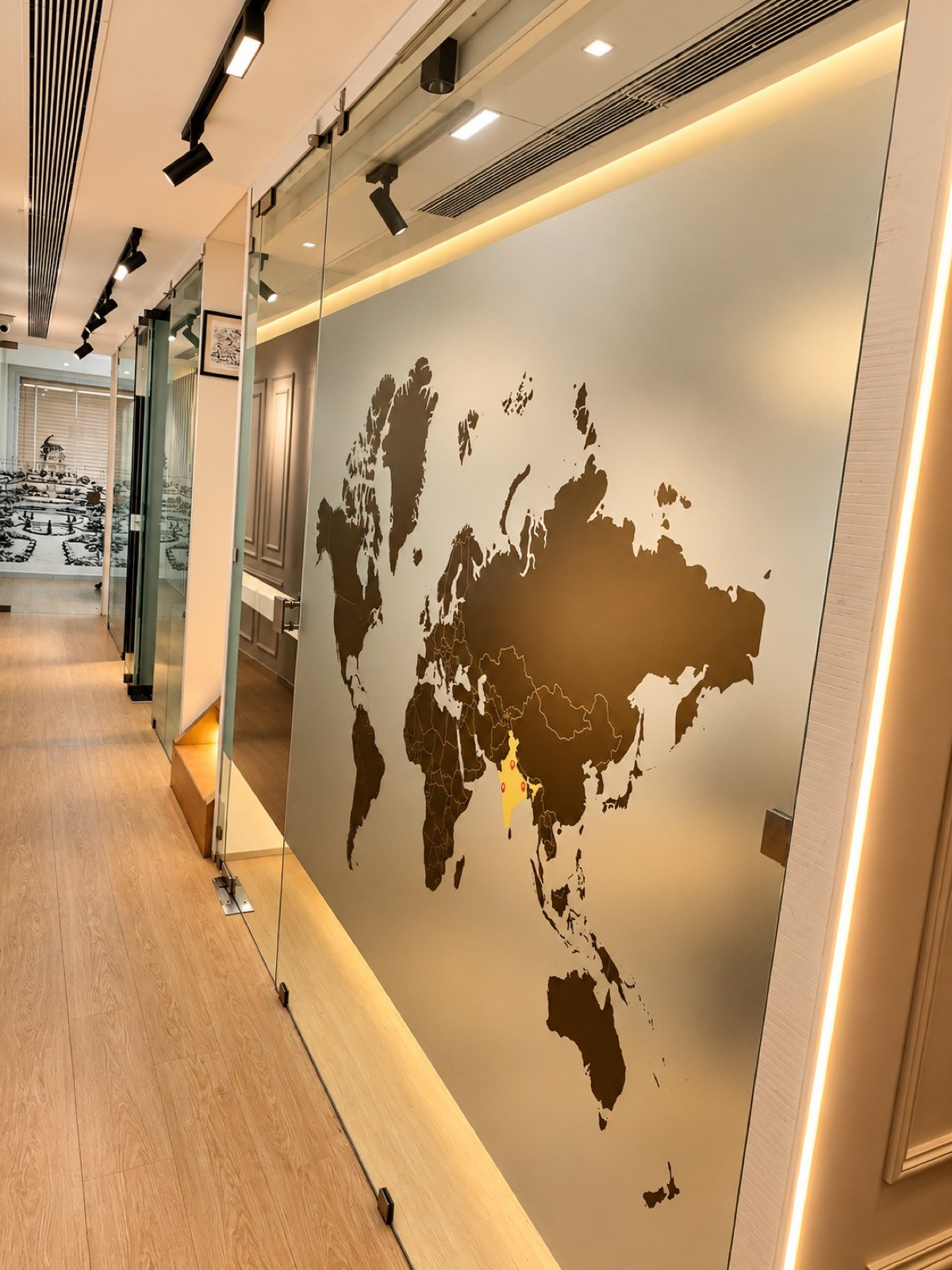 Office glass partitions with frosted film bands and a printed logo