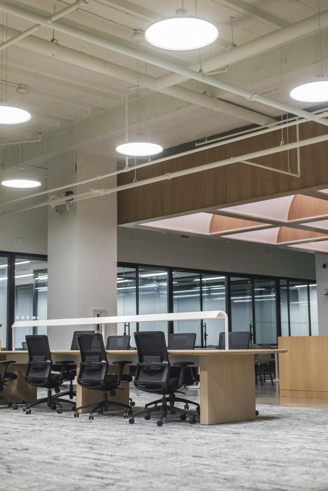 Office ceiling with coloured panels set into the grid